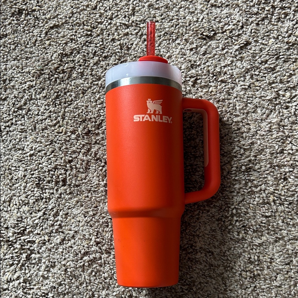 Orange Stanley, in brand new condition.
